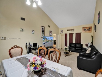 Welcome to your dream condo in the sought-after community of on Woodmont Country Club in Florida - for sale on GolfHomes.com, golf home, golf lot