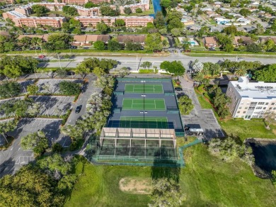 RARELY AVAILABLE PORTOFINO MODEL - 1ST FLOOR UNIT IN COVETED on Sunrise Lakes Phase III in Florida - for sale on GolfHomes.com, golf home, golf lot