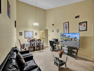 Welcome to your dream condo in the sought-after community of on Woodmont Country Club in Florida - for sale on GolfHomes.com, golf home, golf lot