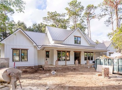 Stunning new construction home in the desirable Hampton on The King and Prince Golf Course, Home of the Hampton Club in Georgia - for sale on GolfHomes.com, golf home, golf lot