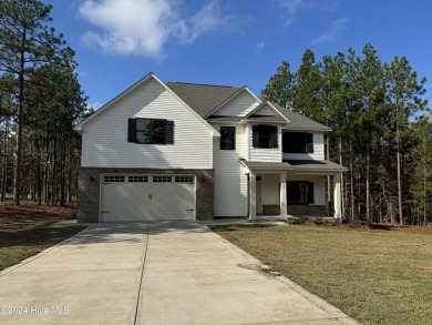 Another Sandhills Custom Homes creation.  Get the craftsmanship on Foxfire Golf and Country Club in North Carolina - for sale on GolfHomes.com, golf home, golf lot