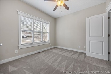 Welcome to this stunning two-story home located in the gated on Carolina Lakes Country Club in North Carolina - for sale on GolfHomes.com, golf home, golf lot