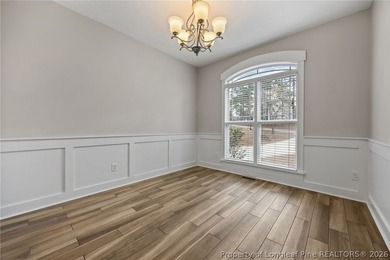 Welcome to this stunning two-story home located in the gated on Carolina Lakes Country Club in North Carolina - for sale on GolfHomes.com, golf home, golf lot