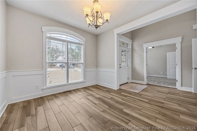 Welcome to this stunning two-story home located in the gated on Carolina Lakes Country Club in North Carolina - for sale on GolfHomes.com, golf home, golf lot