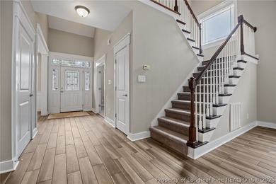 Welcome to this stunning two-story home located in the gated on Carolina Lakes Country Club in North Carolina - for sale on GolfHomes.com, golf home, golf lot