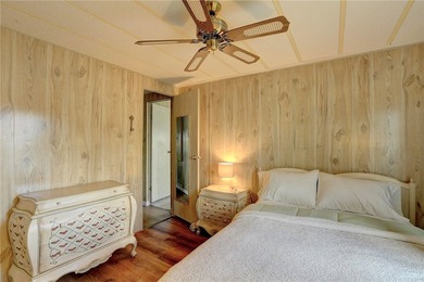 Just a short walk to the golf course, this well-maintained home on Barefoot Bay Golf Course in Florida - for sale on GolfHomes.com, golf home, golf lot