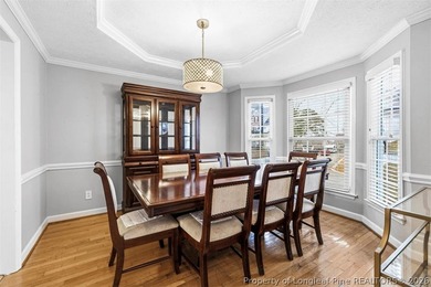 Welcome home to this lovely 3BR/2.5BA home in the desirable on Kings Grant Golf and Country Club in North Carolina - for sale on GolfHomes.com, golf home, golf lot