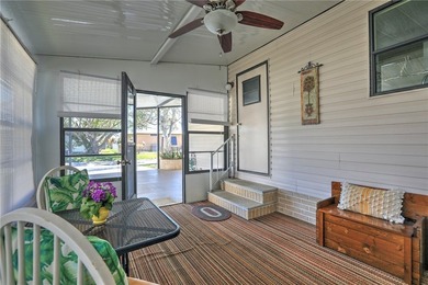 Just a short walk to the golf course, this well-maintained home on Barefoot Bay Golf Course in Florida - for sale on GolfHomes.com, golf home, golf lot