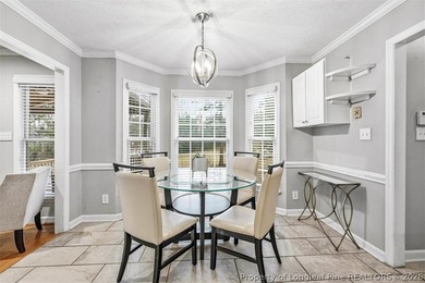 Welcome home to this lovely 3BR/2.5BA home in the desirable on Kings Grant Golf and Country Club in North Carolina - for sale on GolfHomes.com, golf home, golf lot