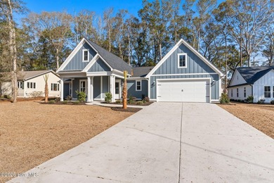 Beautiful new construction home located across from the waterway on Oyster Bay Golf Links in North Carolina - for sale on GolfHomes.com, golf home, golf lot