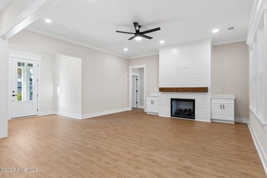 Beautiful new construction home located across from the waterway on Oyster Bay Golf Links in North Carolina - for sale on GolfHomes.com, golf home, golf lot