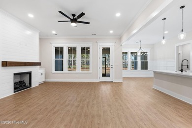 Beautiful new construction home located across from the waterway on Oyster Bay Golf Links in North Carolina - for sale on GolfHomes.com, golf home, golf lot