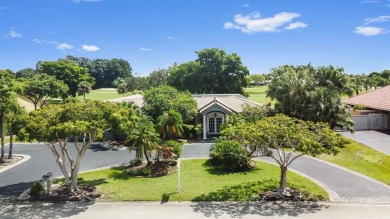GOLF COURSE & WATER VIEW OASIS 4 Bdrms+office, 3 Baths oversized on Country Club of Coral Springs in Florida - for sale on GolfHomes.com, golf home, golf lot