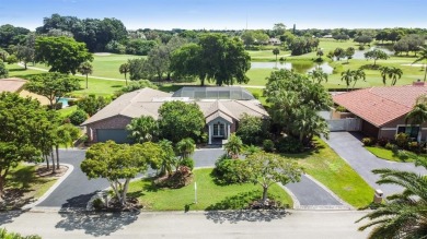 GOLF COURSE & WATER VIEW OASIS 4 Bdrms+office, 3 Baths oversized on Country Club of Coral Springs in Florida - for sale on GolfHomes.com, golf home, golf lot