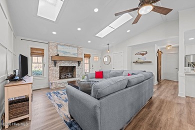 Feel instantly at home as you step into this bright, open on Harbour Point Golf Club in North Carolina - for sale on GolfHomes.com, golf home, golf lot