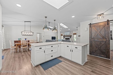 Feel instantly at home as you step into this bright, open on Harbour Point Golf Club in North Carolina - for sale on GolfHomes.com, golf home, golf lot