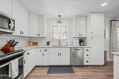 Feel instantly at home as you step into this bright, open on Harbour Point Golf Club in North Carolina - for sale on GolfHomes.com, golf home, golf lot