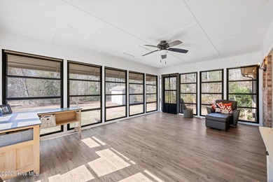 Feel instantly at home as you step into this bright, open on Harbour Point Golf Club in North Carolina - for sale on GolfHomes.com, golf home, golf lot