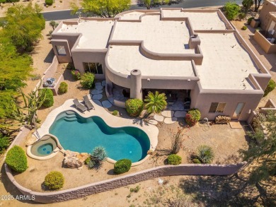 Experience desert living in this stunning 4-bedroom home located on Troon North Golf Club  in Arizona - for sale on GolfHomes.com, golf home, golf lot