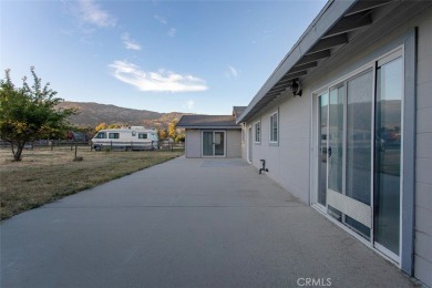 This single-level home is located a few streets from the Oak on Oak Tree Country Club in California - for sale on GolfHomes.com, golf home, golf lot