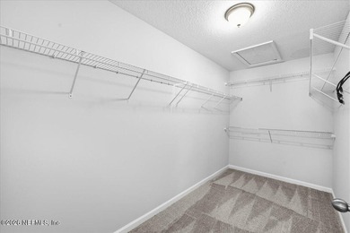 Step into a beautifully refreshed townhome in Segovia, where on Slammer and Squire Golf Course in Florida - for sale on GolfHomes.com, golf home, golf lot