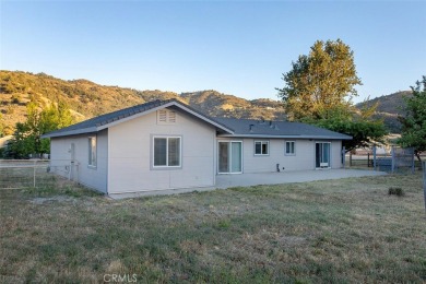 This single-level home is located a few streets from the Oak on Oak Tree Country Club in California - for sale on GolfHomes.com, golf home, golf lot