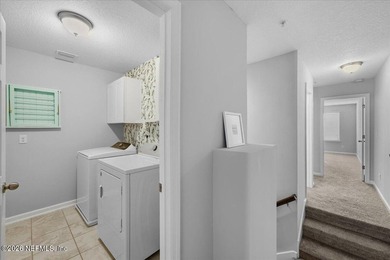 Step into a beautifully refreshed townhome in Segovia, where on Slammer and Squire Golf Course in Florida - for sale on GolfHomes.com, golf home, golf lot