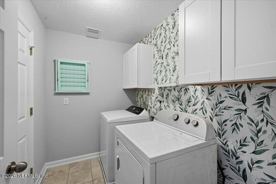 Step into a beautifully refreshed townhome in Segovia, where on Slammer and Squire Golf Course in Florida - for sale on GolfHomes.com, golf home, golf lot