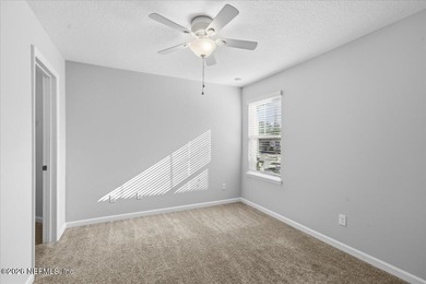 Step into a beautifully refreshed townhome in Segovia, where on Slammer and Squire Golf Course in Florida - for sale on GolfHomes.com, golf home, golf lot