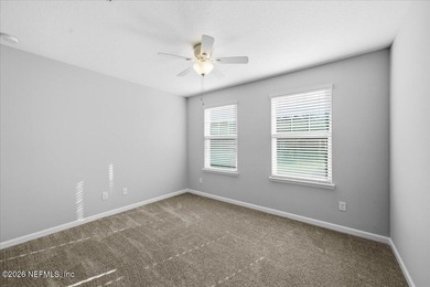 Step into a beautifully refreshed townhome in Segovia, where on Slammer and Squire Golf Course in Florida - for sale on GolfHomes.com, golf home, golf lot