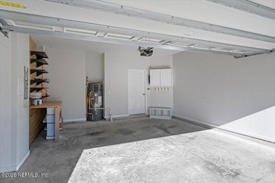 Step into a beautifully refreshed townhome in Segovia, where on Slammer and Squire Golf Course in Florida - for sale on GolfHomes.com, golf home, golf lot