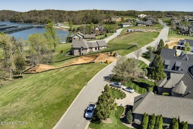 Large, beautiful waterfront lot perfectly situated on the on Wind River Golf Course in Tennessee - for sale on GolfHomes.com, golf home, golf lot