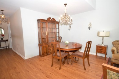 Light-filled Upper Cordova condo at the prestigious 55+ The on The Greens At Half Hollow in New York - for sale on GolfHomes.com, golf home, golf lot