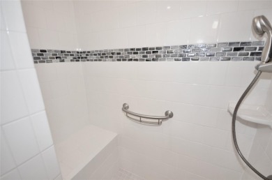 Light-filled Upper Cordova condo at the prestigious 55+ The on The Greens At Half Hollow in New York - for sale on GolfHomes.com, golf home, golf lot