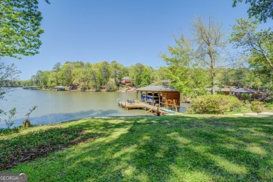 Scenic shores and stylish living in Turtle Cove on Turtle Cove Golf Course in Georgia - for sale on GolfHomes.com, golf home, golf lot
