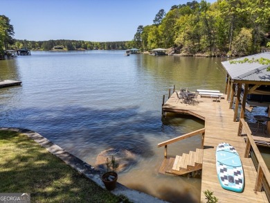 Scenic shores and stylish living in Turtle Cove on Turtle Cove Golf Course in Georgia - for sale on GolfHomes.com, golf home, golf lot