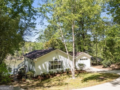 Scenic shores and stylish living in Turtle Cove on Turtle Cove Golf Course in Georgia - for sale on GolfHomes.com, golf home, golf lot