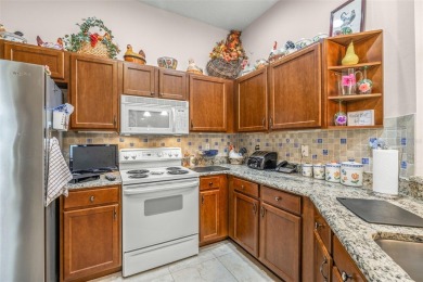 Welcome to this lushly landscaped 2 bedrooms, 2 bath condominium on Scepter Golf Club in Florida - for sale on GolfHomes.com, golf home, golf lot