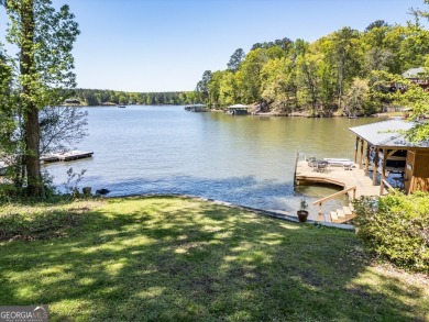 Scenic shores and stylish living in Turtle Cove on Turtle Cove Golf Course in Georgia - for sale on GolfHomes.com, golf home, golf lot