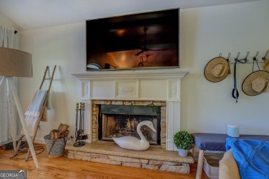 Scenic shores and stylish living in Turtle Cove on Turtle Cove Golf Course in Georgia - for sale on GolfHomes.com, golf home, golf lot