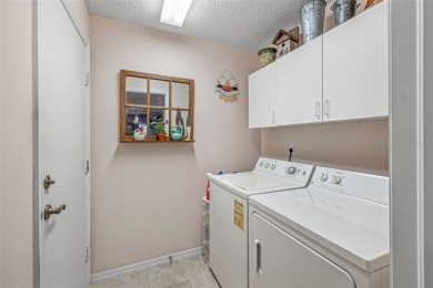 Welcome to this lushly landscaped 2 bedrooms, 2 bath condominium on Scepter Golf Club in Florida - for sale on GolfHomes.com, golf home, golf lot