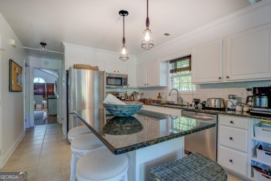 Scenic shores and stylish living in Turtle Cove on Turtle Cove Golf Course in Georgia - for sale on GolfHomes.com, golf home, golf lot
