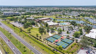 Welcome to this lushly landscaped 2 bedrooms, 2 bath condominium on Scepter Golf Club in Florida - for sale on GolfHomes.com, golf home, golf lot