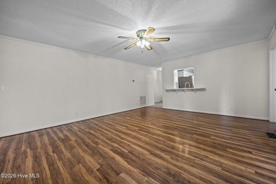 Welcome home to this beautifully updated single-level residence on Woodlake Country Club in North Carolina - for sale on GolfHomes.com, golf home, golf lot