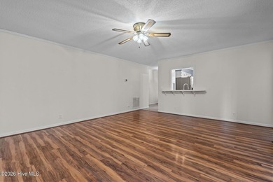 Welcome home to this beautifully updated single-level residence on Woodlake Country Club in North Carolina - for sale on GolfHomes.com, golf home, golf lot