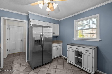 Welcome home to this beautifully updated single-level residence on Woodlake Country Club in North Carolina - for sale on GolfHomes.com, golf home, golf lot