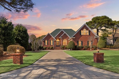 Love to entertain while enjoying stunning views of the pond and on Members Club At St. James Plantation in North Carolina - for sale on GolfHomes.com, golf home, golf lot