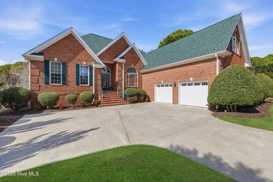 Love to entertain while enjoying stunning views of the pond and on Members Club At St. James Plantation in North Carolina - for sale on GolfHomes.com, golf home, golf lot