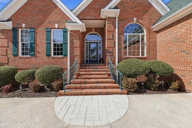 Love to entertain while enjoying stunning views of the pond and on Members Club At St. James Plantation in North Carolina - for sale on GolfHomes.com, golf home, golf lot