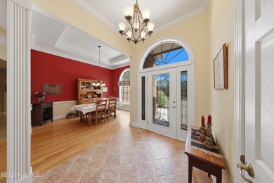 Love to entertain while enjoying stunning views of the pond and on Members Club At St. James Plantation in North Carolina - for sale on GolfHomes.com, golf home, golf lot